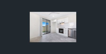 Modern Two Bedroom Duplex WITH A YARD! - Photo 3