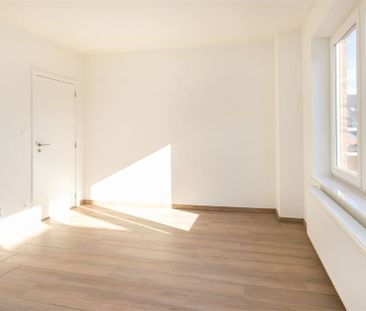 Ruim appartement met 2 slaapkamers in het centrum van Bilzen! - Photo 6