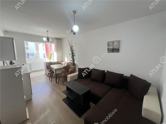 Garsoniera decomandata etaj 1 si loc de parcare zona Turniso - Fotografie 1