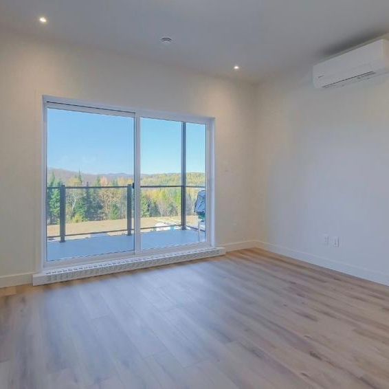 4 1/2 condo locatif neuf - Photo 1