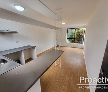 Stylish & Low-Maintenance Apartment Living in a Convenient Location - Photo 3