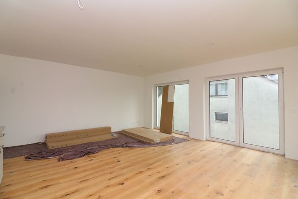 Erstbezug! Ansprechende 2 Zimmer-Neubauwohnung mit Balkon - Photo 1