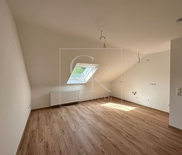 Erstbezug nach Modernisierung von heller gemütlicher DG-Wohnung - Foto 1