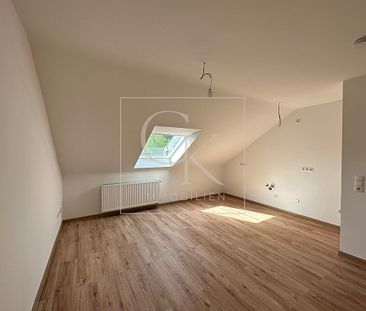 Erstbezug nach Modernisierung von heller gemütlicher DG-Wohnung - Photo 2