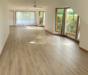 STYLISH TWO BED TOWNHOUSE JUST STEPS FROM THE BEACH - Photo 1