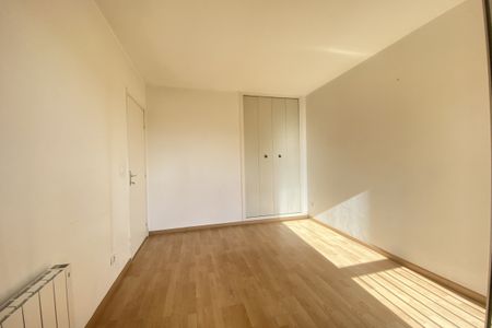Appartement type 3 pièces loué vide avec garage et cave dans - Photo 4