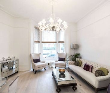 A bright and contemporary apartment to rent positioned on the raised ground floor of a period conversion. - Photo 2