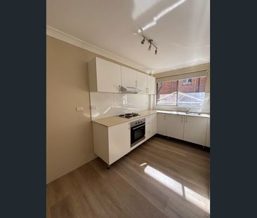 NEWLY RENOVATED 2 BEDROOM UNIT - Photo 2