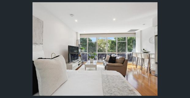 FULLY FURNISHED CITY STUDIO – Modern Living in Concerto Tower - Photo 1