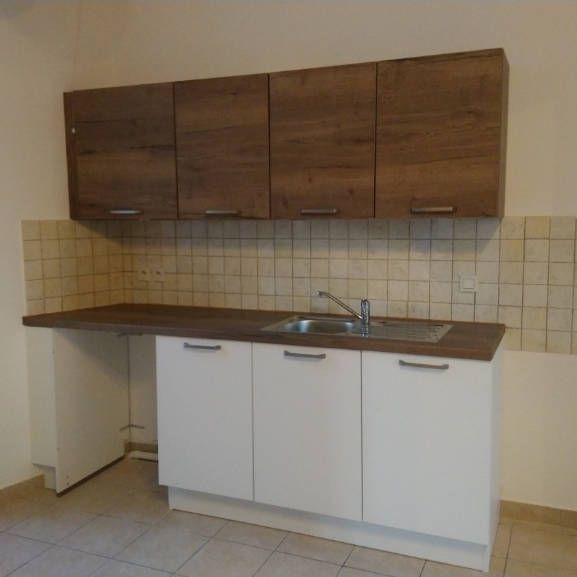 Location appartement 4 pièces 112 m² à Oyonnax (01100) CENTRE VILLE - Photo 1