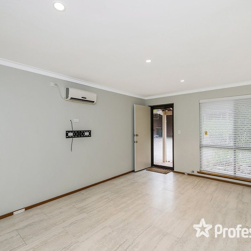 Beautifully Renovated 2-Bedroom Home - Photo 1