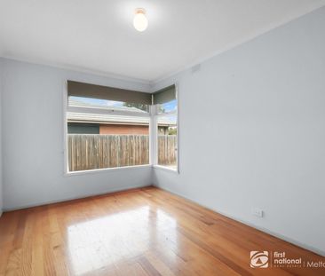 Charming Three-Bedroom Home - Photo 3