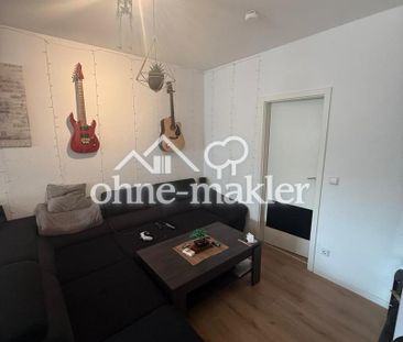 Helle 2,5-Zimmer-Wohnung mit Einbauküche in gepflegtem 5-Parteienha... - Foto 1