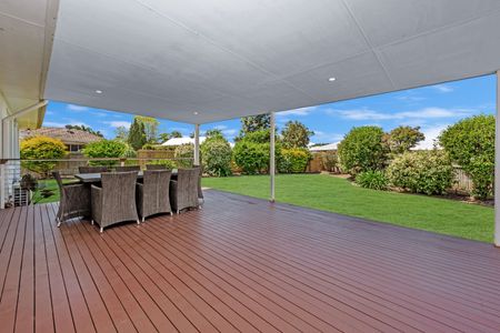 Family-Friendly Gem with Expansive Entertaining Deck & Yard Maintenance Included - Photo 2