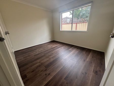 Stylish Home Featuring Open-Plan Living and Secure Parking - Photo 5