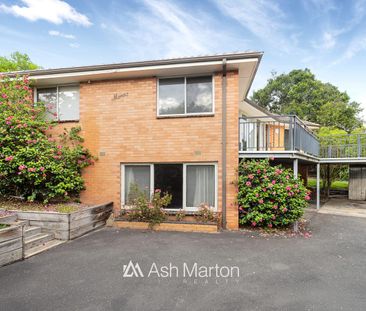 Spacious Family Home with Garden, Balcony, and Versatile Living Spaces - Photo 6