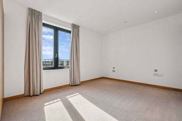 Do you think it would be stronger to say "Three-bedroom apartment in Ram Quarter. - Photo 1