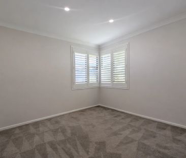 Spacious & Comfortable Family Home in a Convenient Gorokan Location - Photo 6