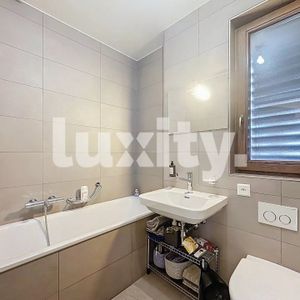 Renovated attic with modern comfort - Photo 2