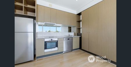 City Views, Large Balcony & Spacious Living in Prime North Melbourne - Photo 3