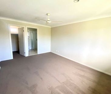 Modern 4-Bedroom Home in Prime Coomera Location - Photo 2