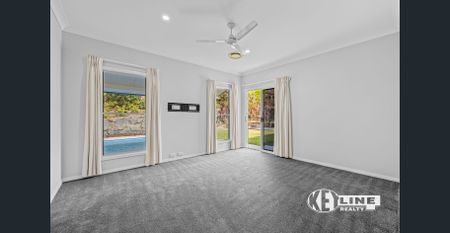 Spacious Four-Bedroom Home with Pool & Multiple Living Areas - Photo 2