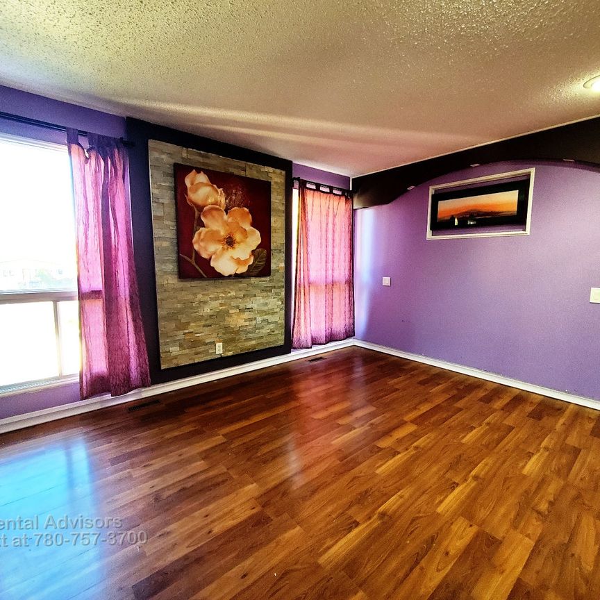 GREAT 4 BED, 2 BATH, 4 LEVEL SPLIT SINGLE FAMILY HOME W/ A DOUBLE ATTACHED GARAGE IN THE COMMUNITY OF BELMONT - Photo 1