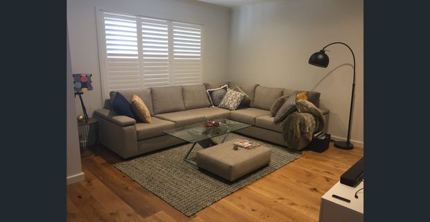 Ultimate Family Comfort in Harcrest's Stunning Double-Story Townhouse - Photo 1