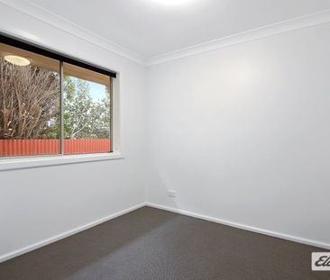 Convenient & Comfortable 2-Bedroom Home in Prime Location - Photo 2