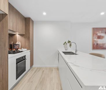 Top-Floor Two Bedroom | Rare Layout with Seamless Indoor-Outdoor Li... - Photo 5