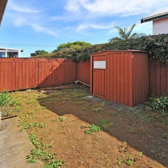 Two-Bedroom Unit with Garage and Private Backyard - Photo 2