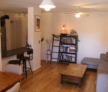 North-facing, Sun-Drenched, Renovated in Convenient Location - Photo 2