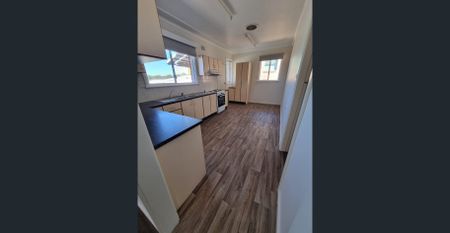 NEAT AS A PIN & MINUTES TO ALL AMENTIES - Photo 5