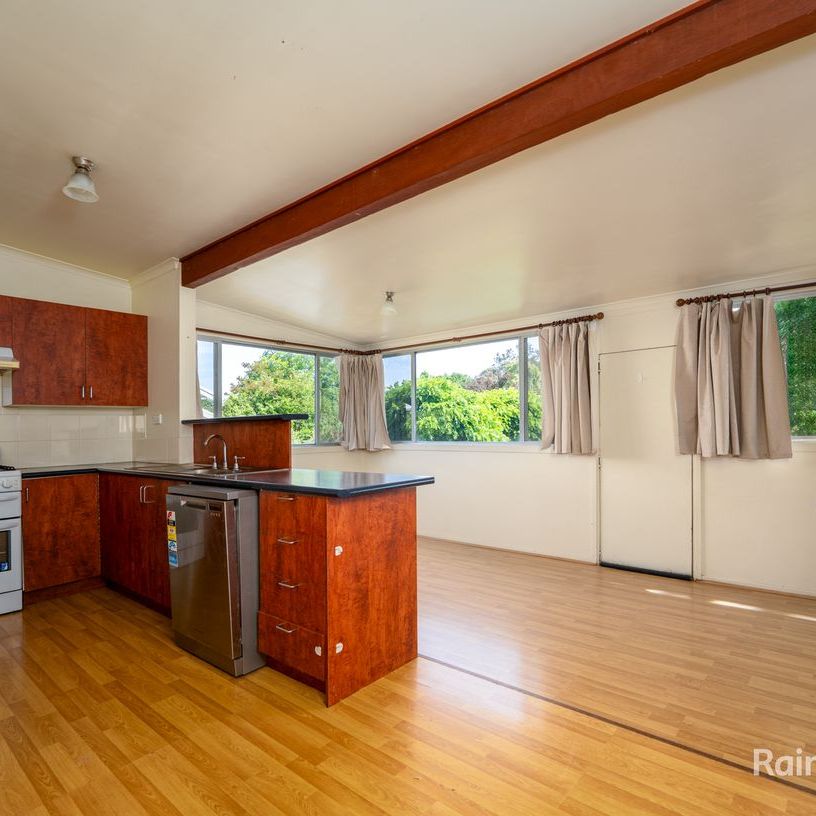 Well-Appointed Home with a Large Flat Backyard in a Central Location - Photo 1