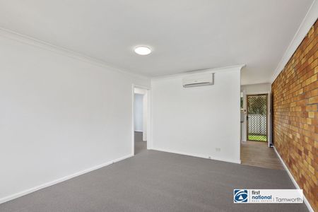 Freshly renovated 2-bedroom unit - Photo 2