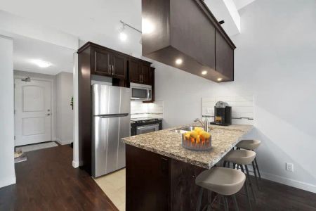 Yorkson Grove Apartments — 1 Bedroom + Den available at 8026 207th Street, Langley - Photo 2