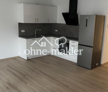 Erstbezug: Tolle 3-Zimmer Wohnungen in energieeffizientem KFW55 Haus - Photo 1