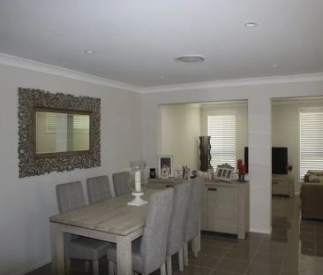 Modern Family Living in the Heart of Oran Park - Photo 1