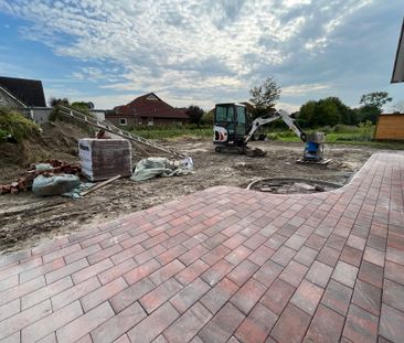 Neubauwohnung im Erdgeschoss mit großer Garage und Garten - Foto 4