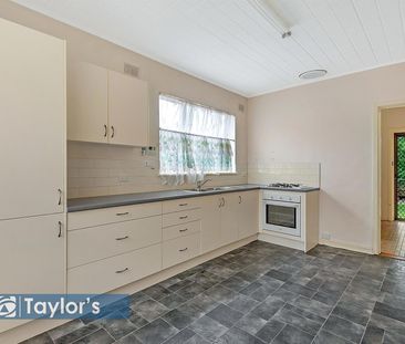 CONVENIENTLY LOCATED UPDATED FAMILY HOME - Photo 3
