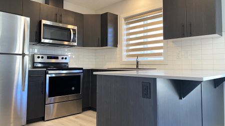 Modern 3 Storey Townhome | Double Attached Garage | Altius Tamarack - Photo 4