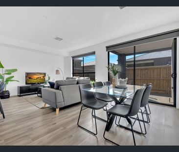 Spacious 4-Bedroom Family Home with Modern Features - Photo 2