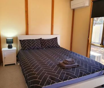 Neat & Tidy Fully Furnished 3-Bedroom Unit - Photo 1