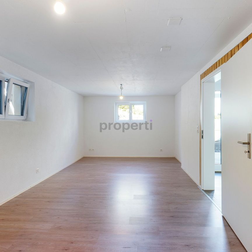 Charmante 2.5-Zimmer Wohnung in ruhigem Einfamilienhaus-Wohnquartier - Foto 1