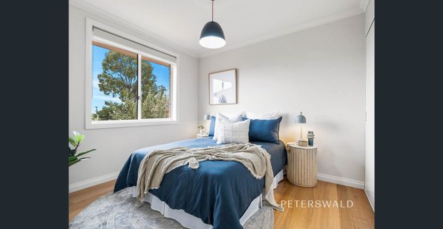 Family home with coastal vibes - Photo 1