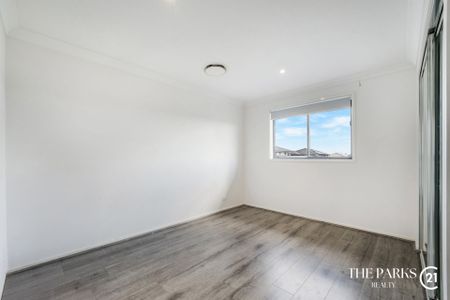 Ultra-Modern Family Home in the Heart of Marsden Park - Photo 2