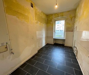 Für Mieter mit Ideen: renovierungsbedürftige 3-Zimmer Wohnung mit v... - Foto 1