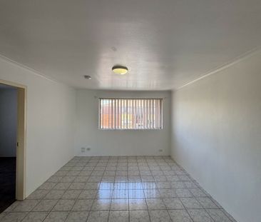 Two Bedroom Top Floor Unit - Photo 6