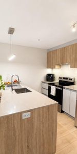 1997.00/mois - Cession de bail – 3½ moderne à Brossard | Accès direct REM | Quartier DIX30 - Photo 3