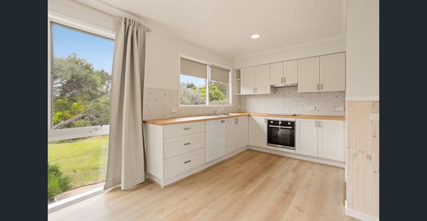 Fully Renovated Coastal Home - Photo 1